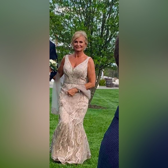 Mon Cheri intricate lace and beaded gown in champagne. - Picture 7 of 7